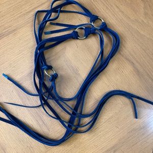 Vintage boho navy suede belt with brass rings.